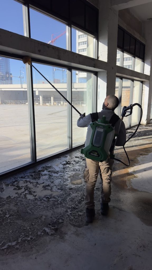 Licensed Direct Pest Solutions technician spraying for pests